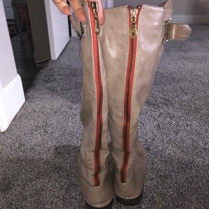 Riding boots with red stripe zipper